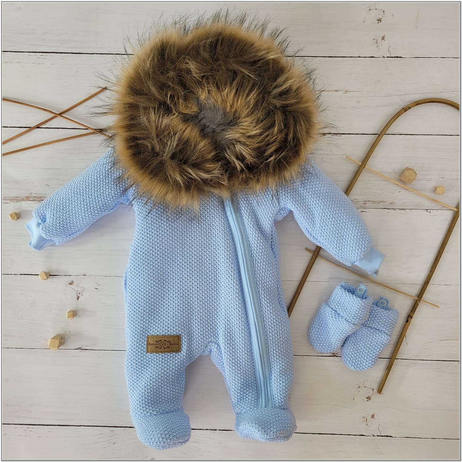 Luxusná kojenecká kombinéza pletená modrá  s kožušinkou